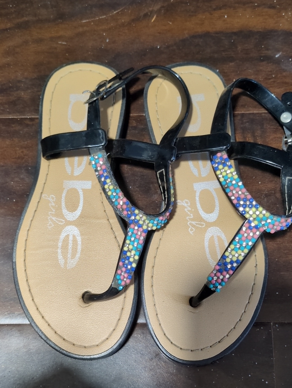 bebe Black T-Strap Girls' Sandals with Multicolor Gem Accents